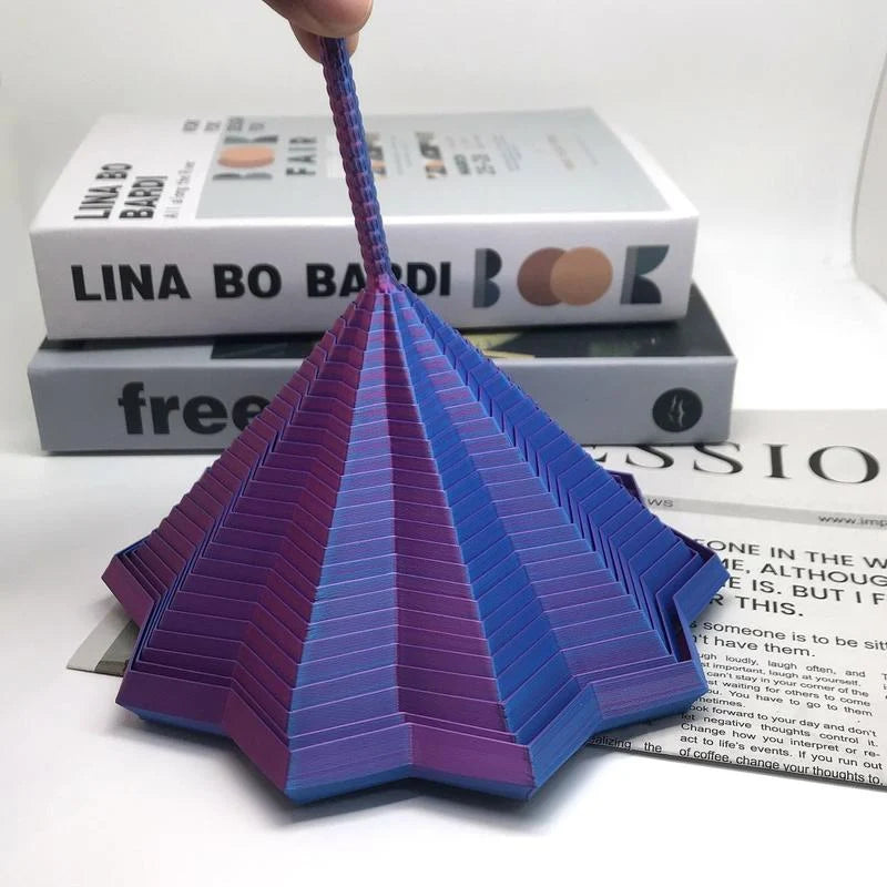 Purple layered star spinner raised into a cone shape