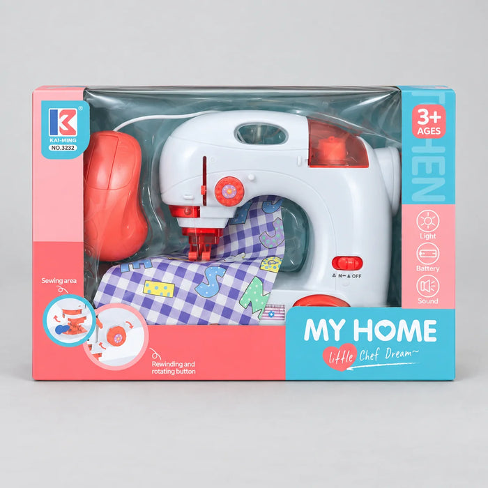 Kids' toy sewing machine with fabric in retail packaging