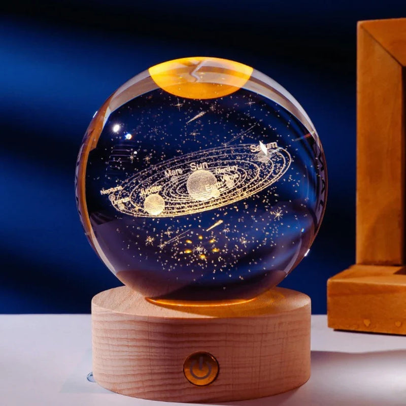 Crystal ball lamp with engraved solar system design